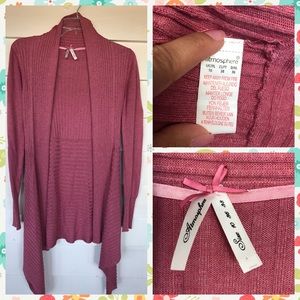 Asymmetrical long sweater.